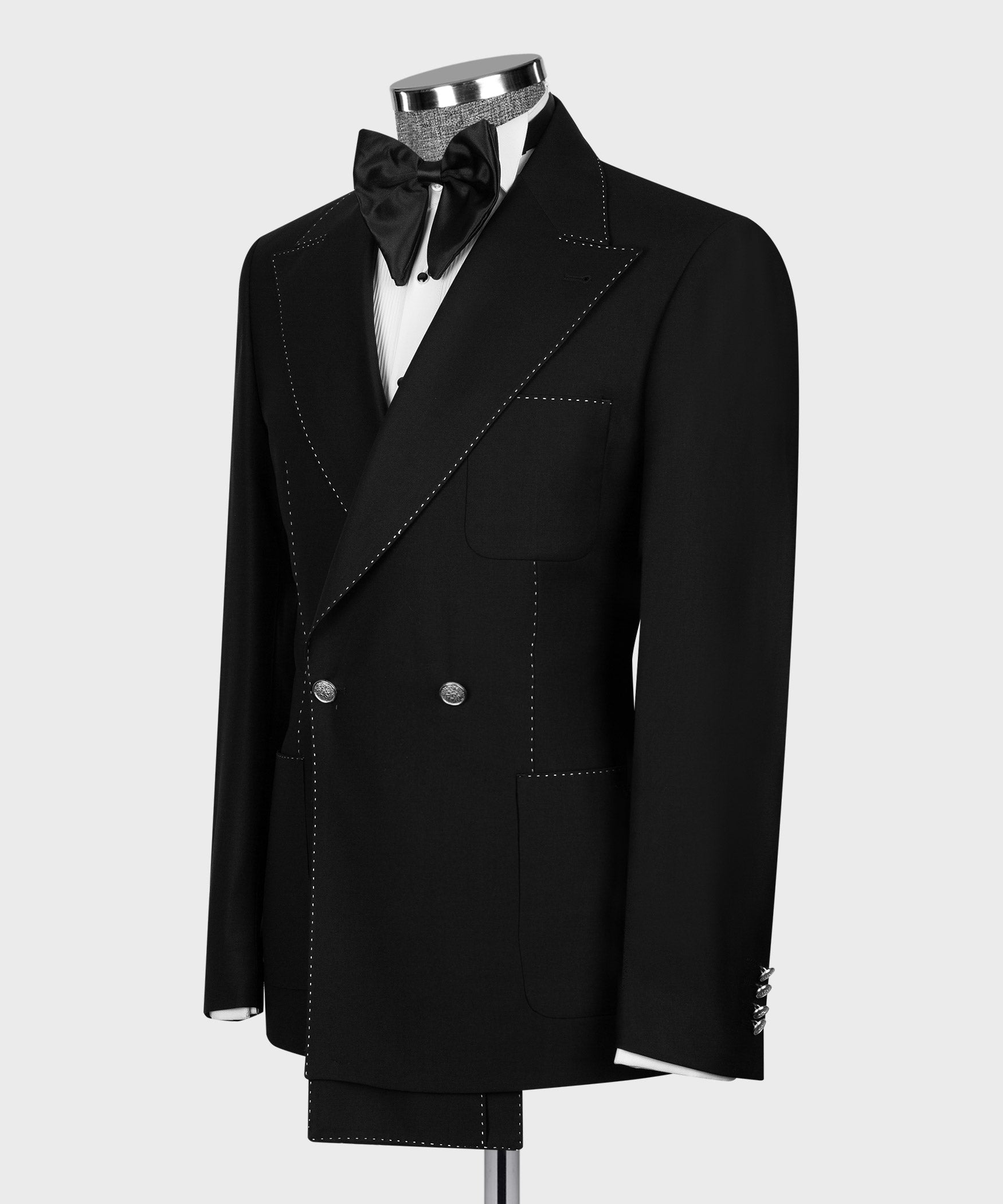 Black double-breasted tuxedo jacket with white contrast stitching and peak lapel