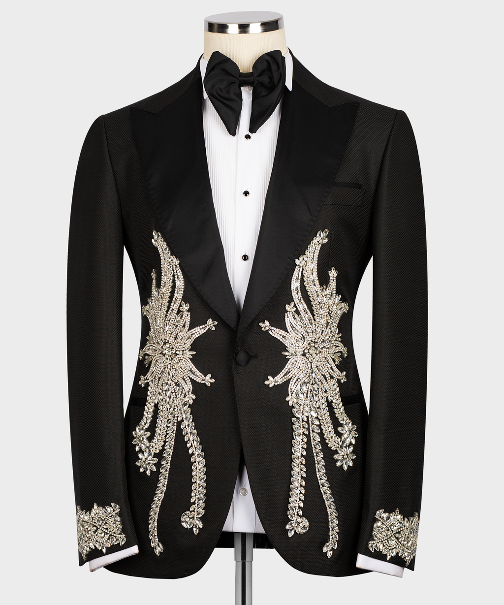 Black tuxedo jacket with ornate silver stone embroidery, bow tie, waistcoat