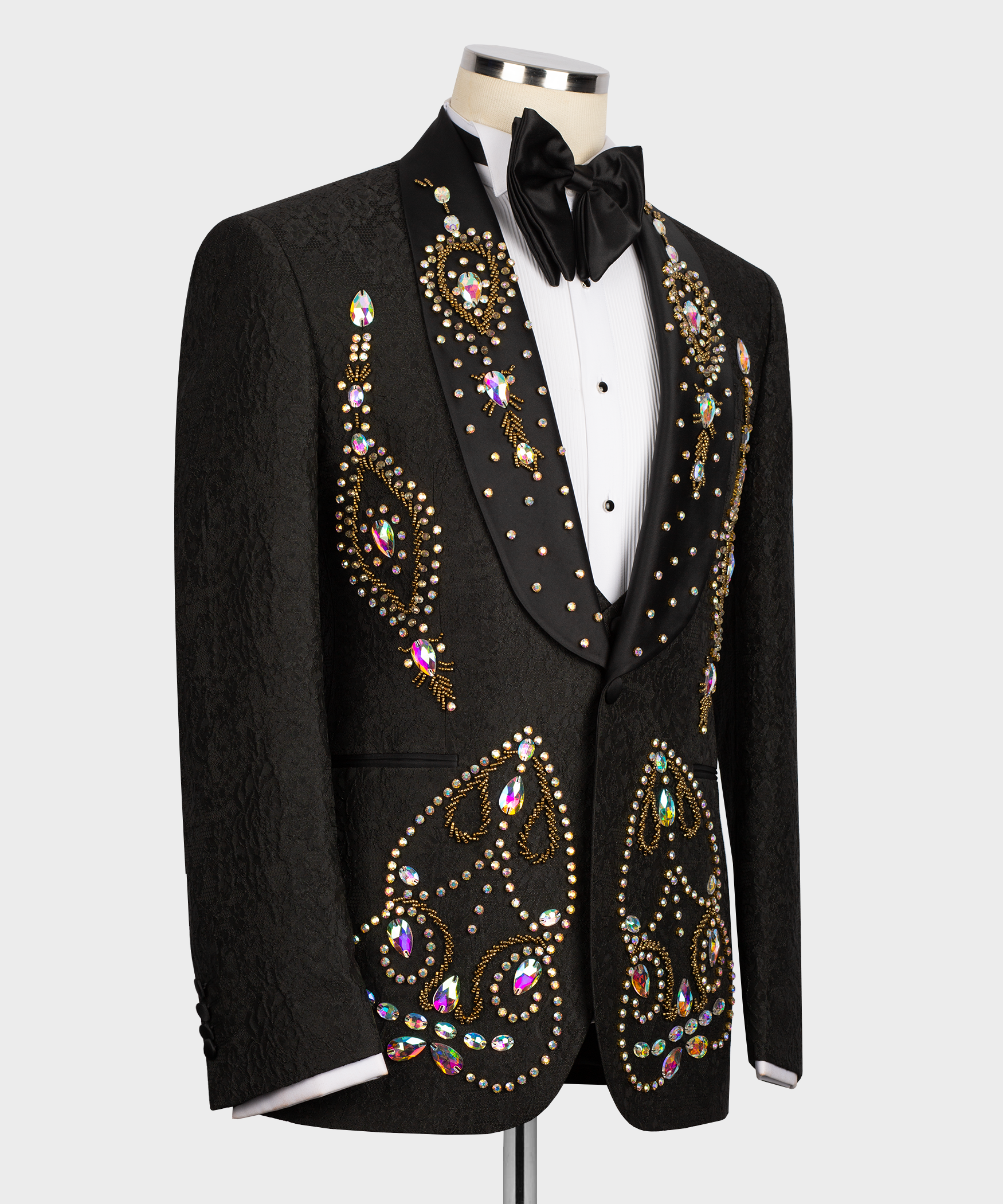 Front view of black tuxedo suit with bow tie and rhinestone hand embroidery on lapels