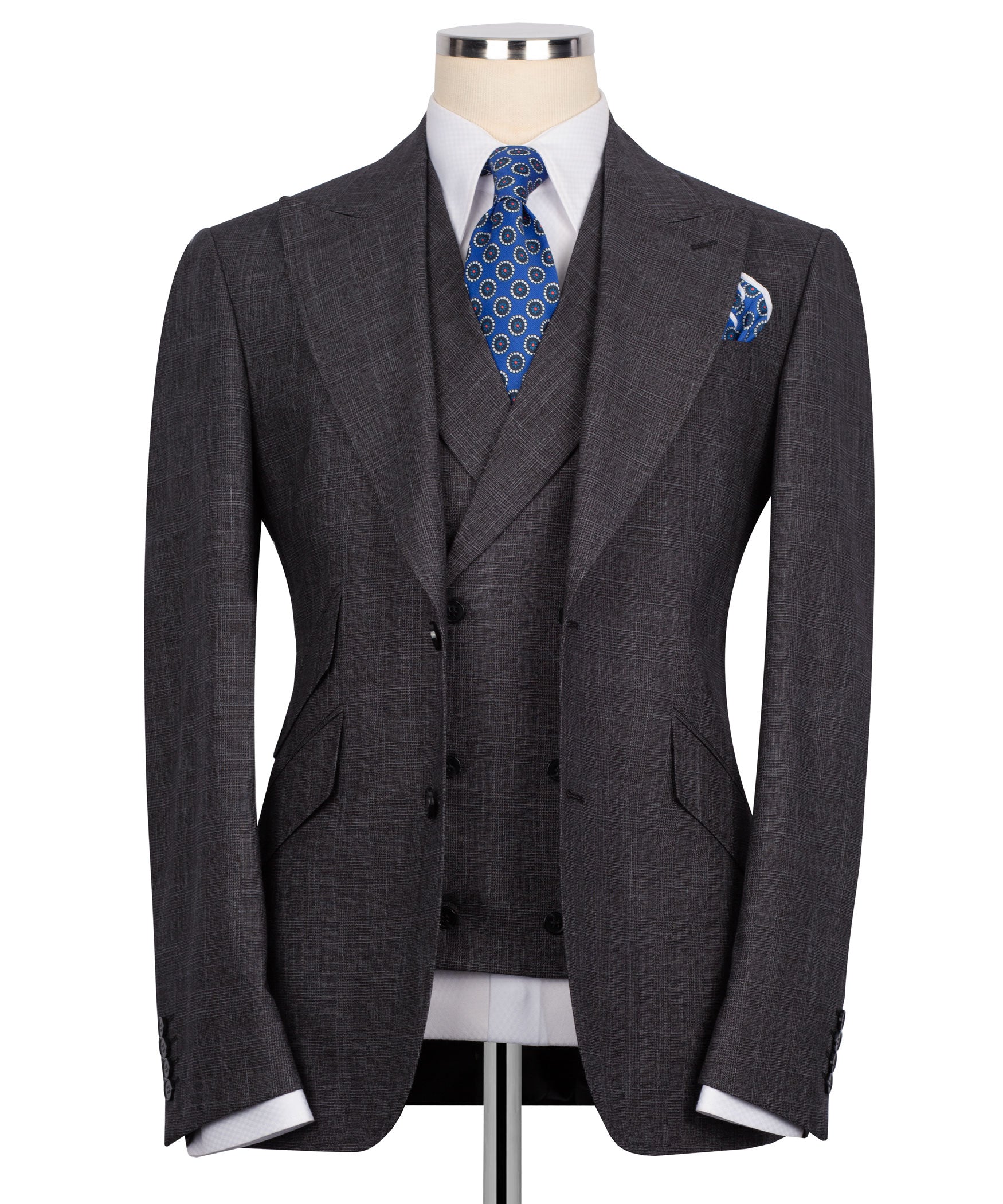 Plaid three-piece vest suit: dark jacket and vest with blue patterned tie and pocket square