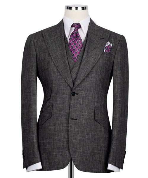 Black plaid men's suit jacket, front view with purple patterned tie and chest pocket square