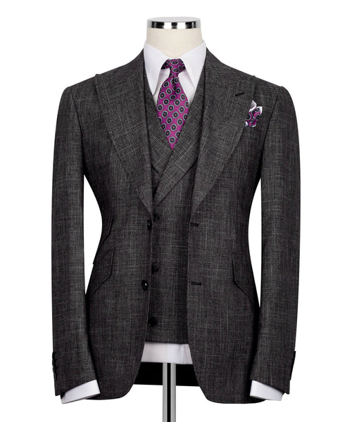 Black plaid men's suit jacket with notch lapels, purple patterned tie and pocket square