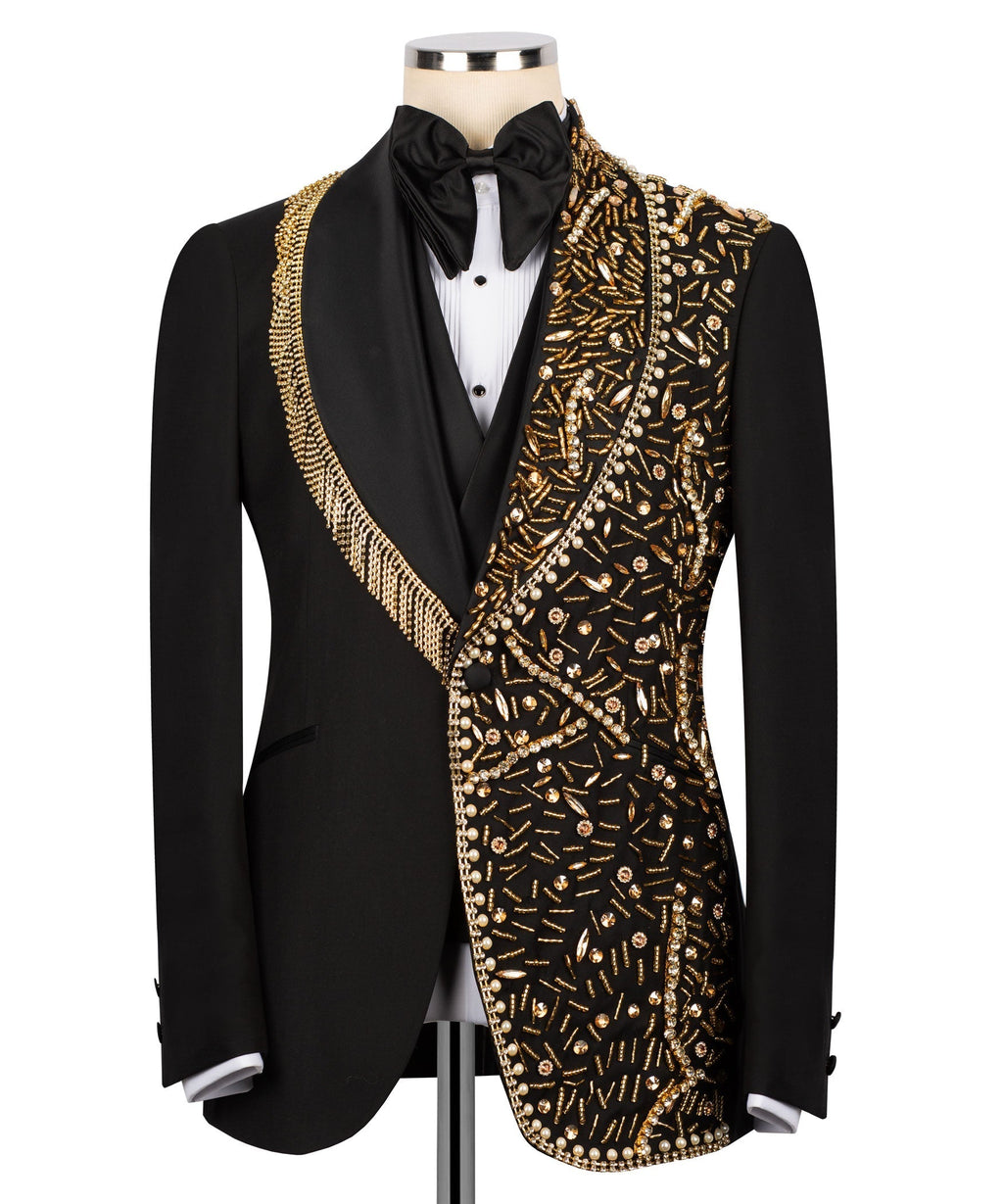 Men's black tuxedo jacket with gold stone embroidery and satin bow tie, peak lapel