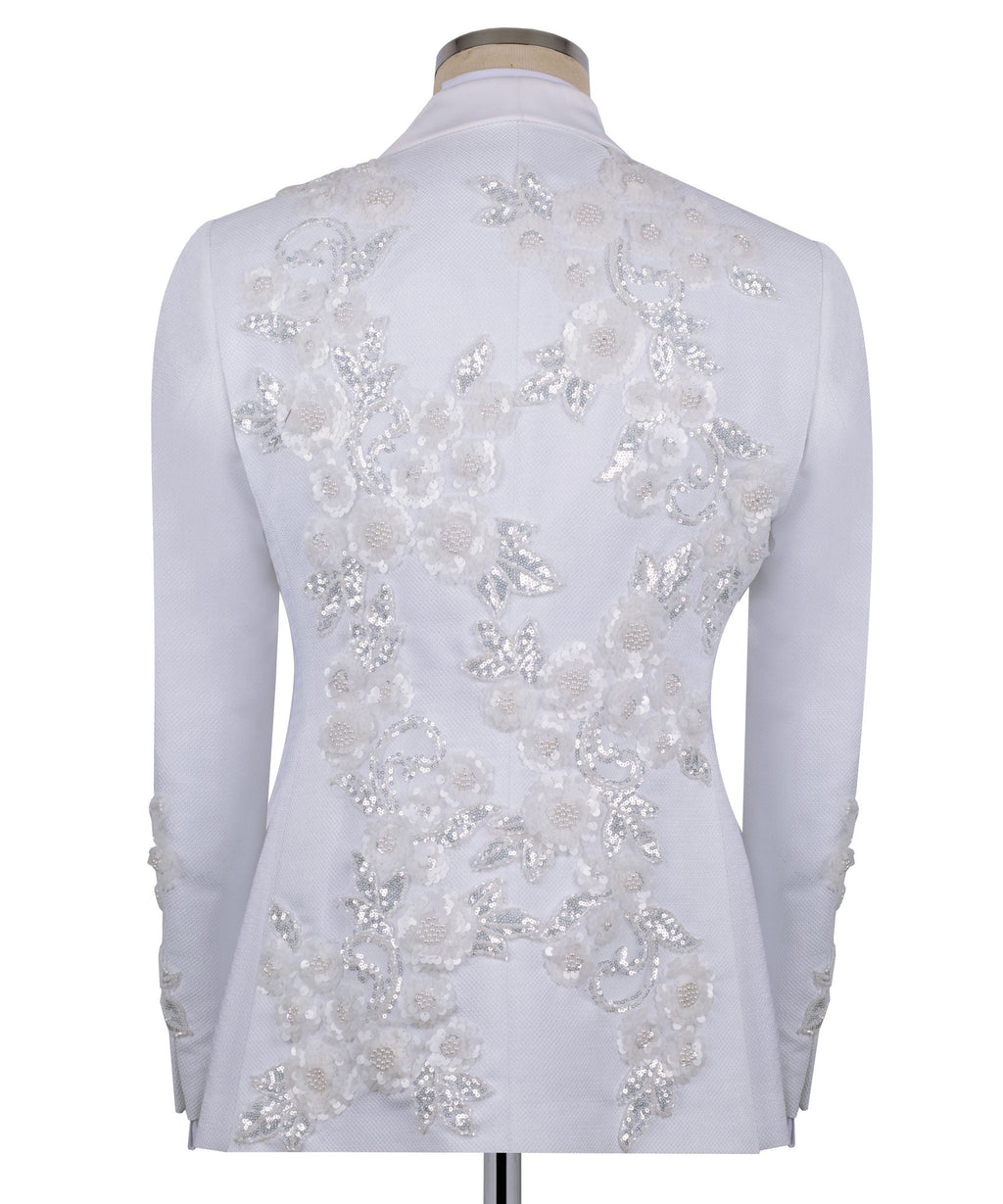 Back view of white tuxedo jacket with floral sequined embroidery