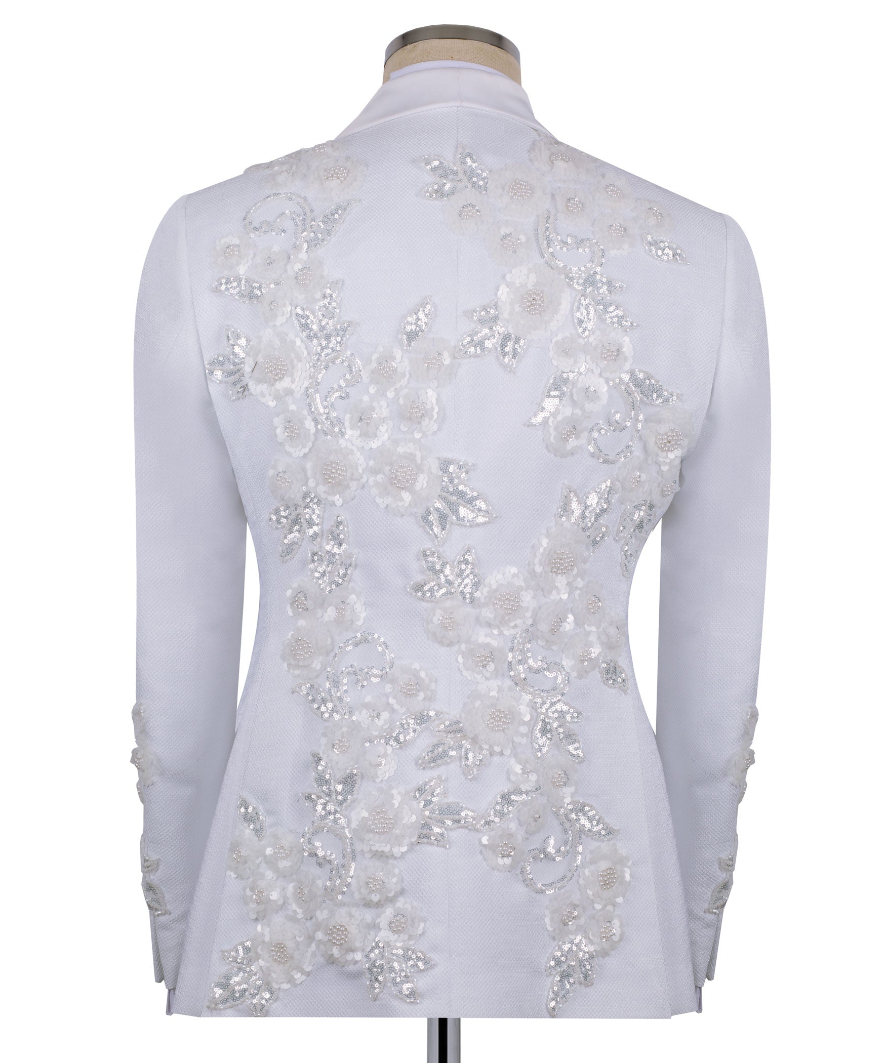 Back view of white tuxedo jacket with floral sequined embroidery