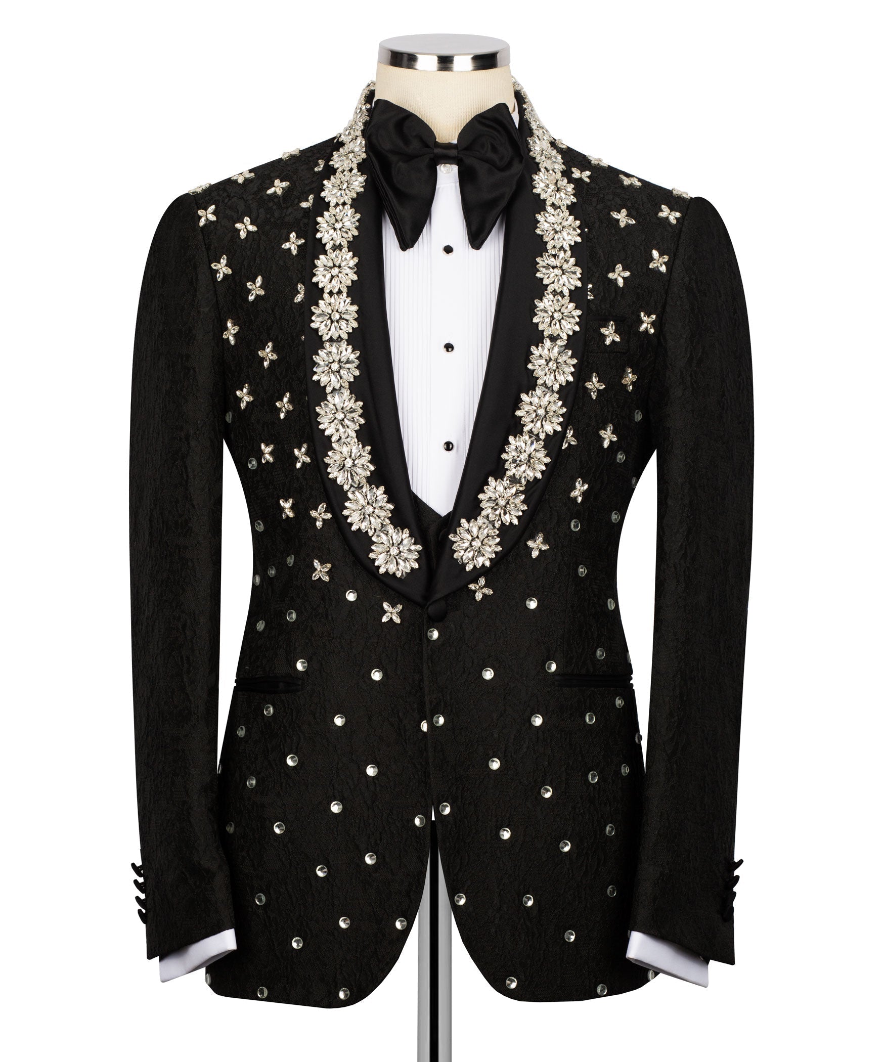 Black tuxedo jacket with central floral vine embroidery and bow at neckline over vest