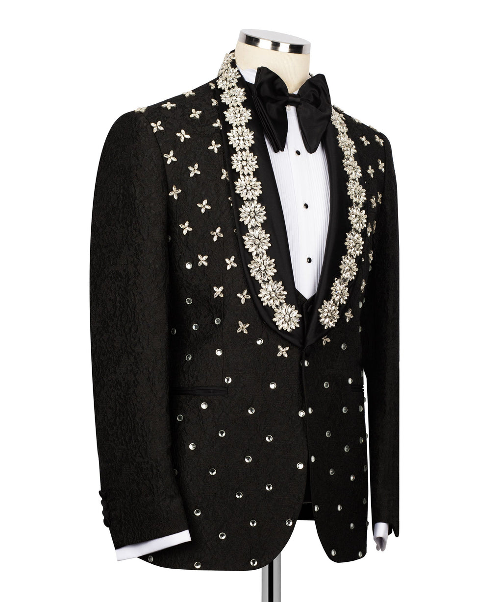 Black tuxedo jacket with floral vine and butterfly embroidery across chest and pockets