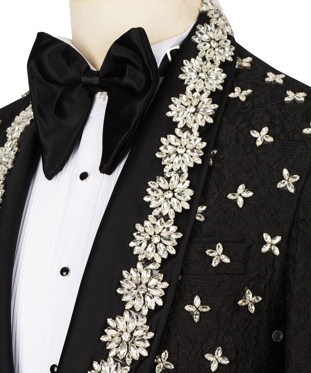 Black bow tie with rhinestone floral trim on tuxedo lapel and butterfly embellishments