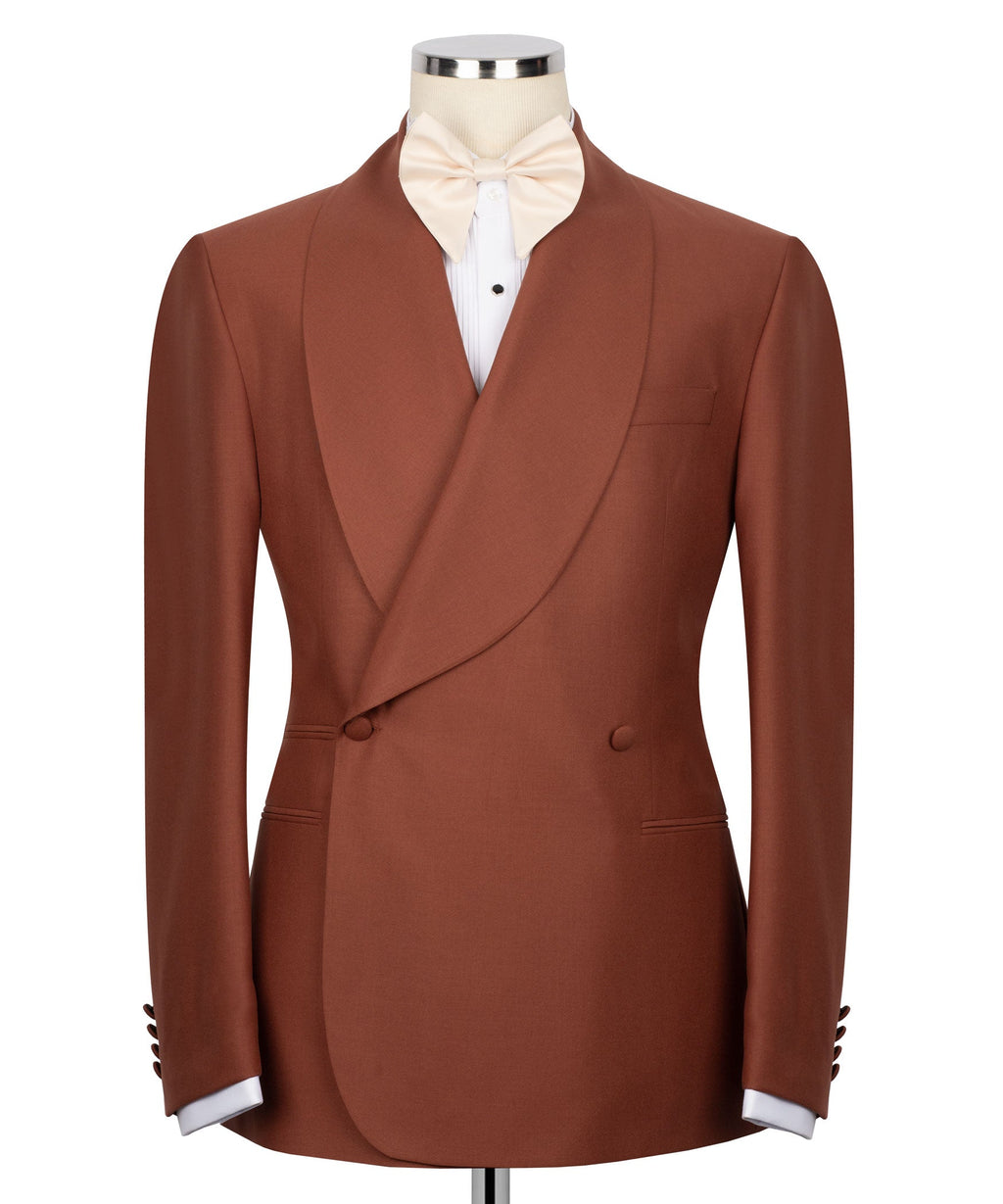 Brick color tuxedo blazer with cream bow tie, notch lapels, and two-button front