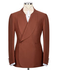 Brick color tuxedo blazer with cream bow tie, notch lapels, and two-button front