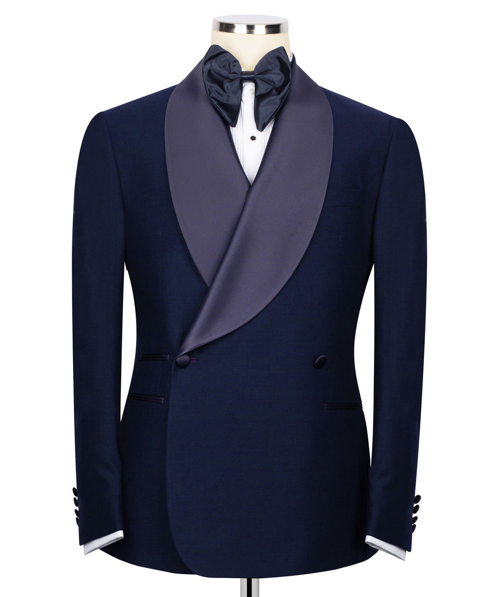 Navy blue tuxedo jacket with satin shawl lapel and black bow tie