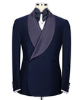 Navy blue tuxedo jacket with satin shawl lapel and black bow tie