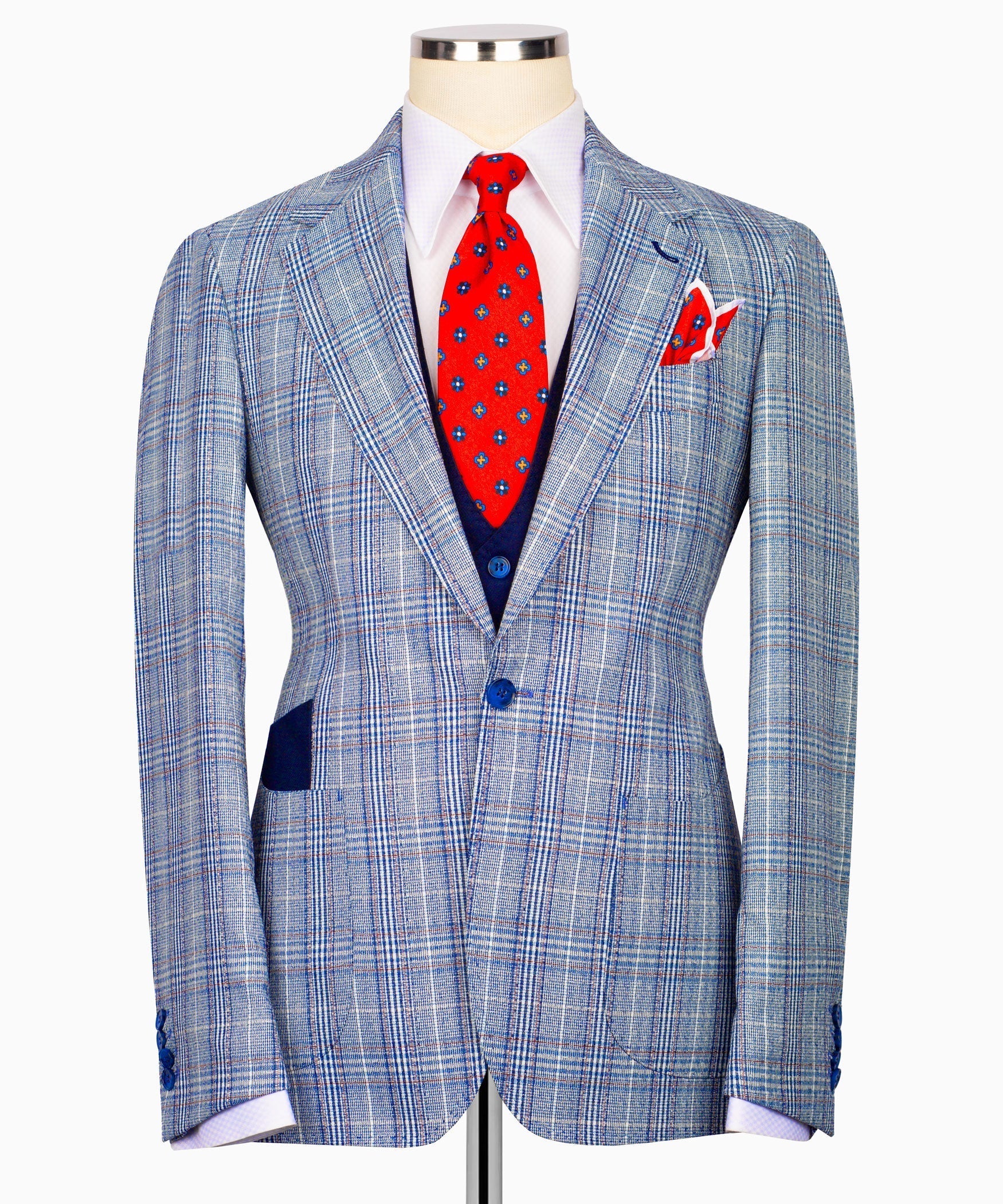 Light blue plaid three-piece suit jacket with red patterned tie and welt pockets