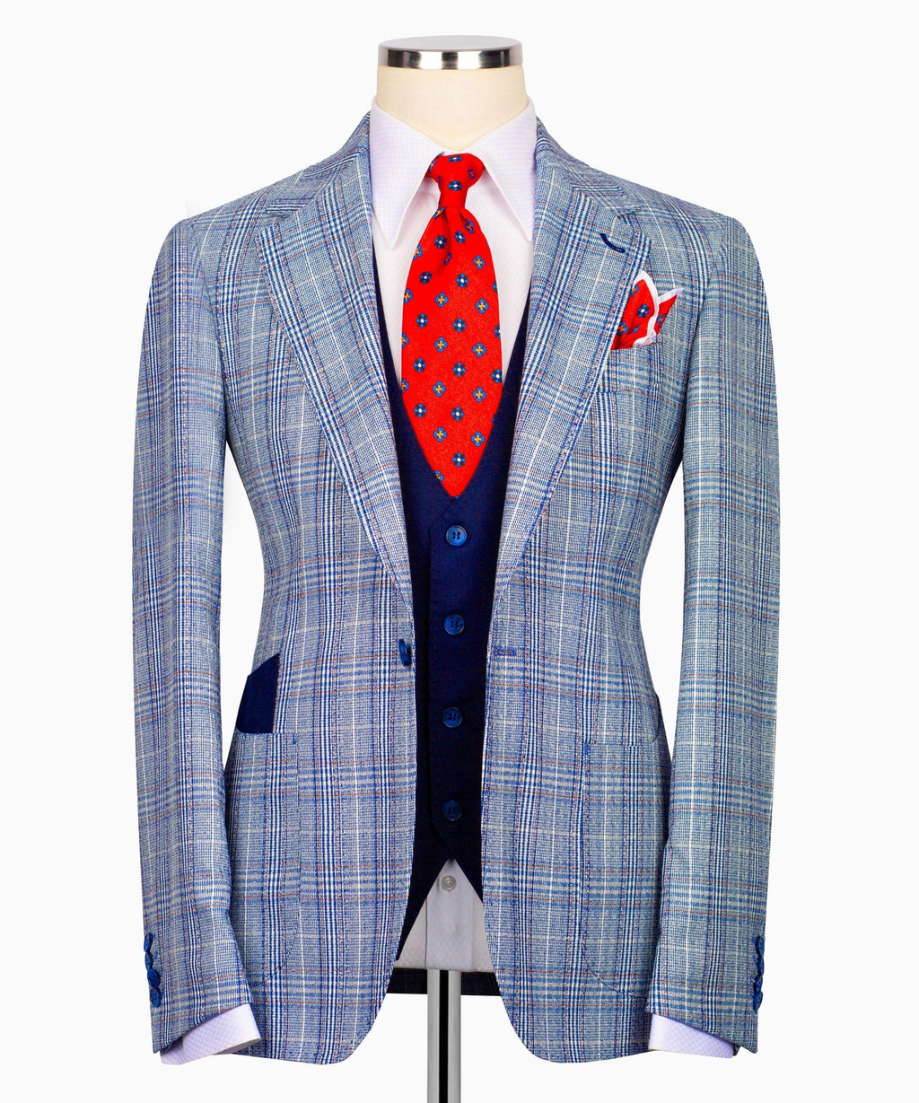 Light blue plaid suit jacket with notched lapels and flap pocket, navy buttons