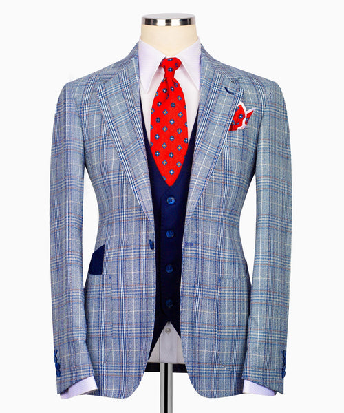 Light blue plaid suit jacket with notched lapels and flap pocket, navy buttons