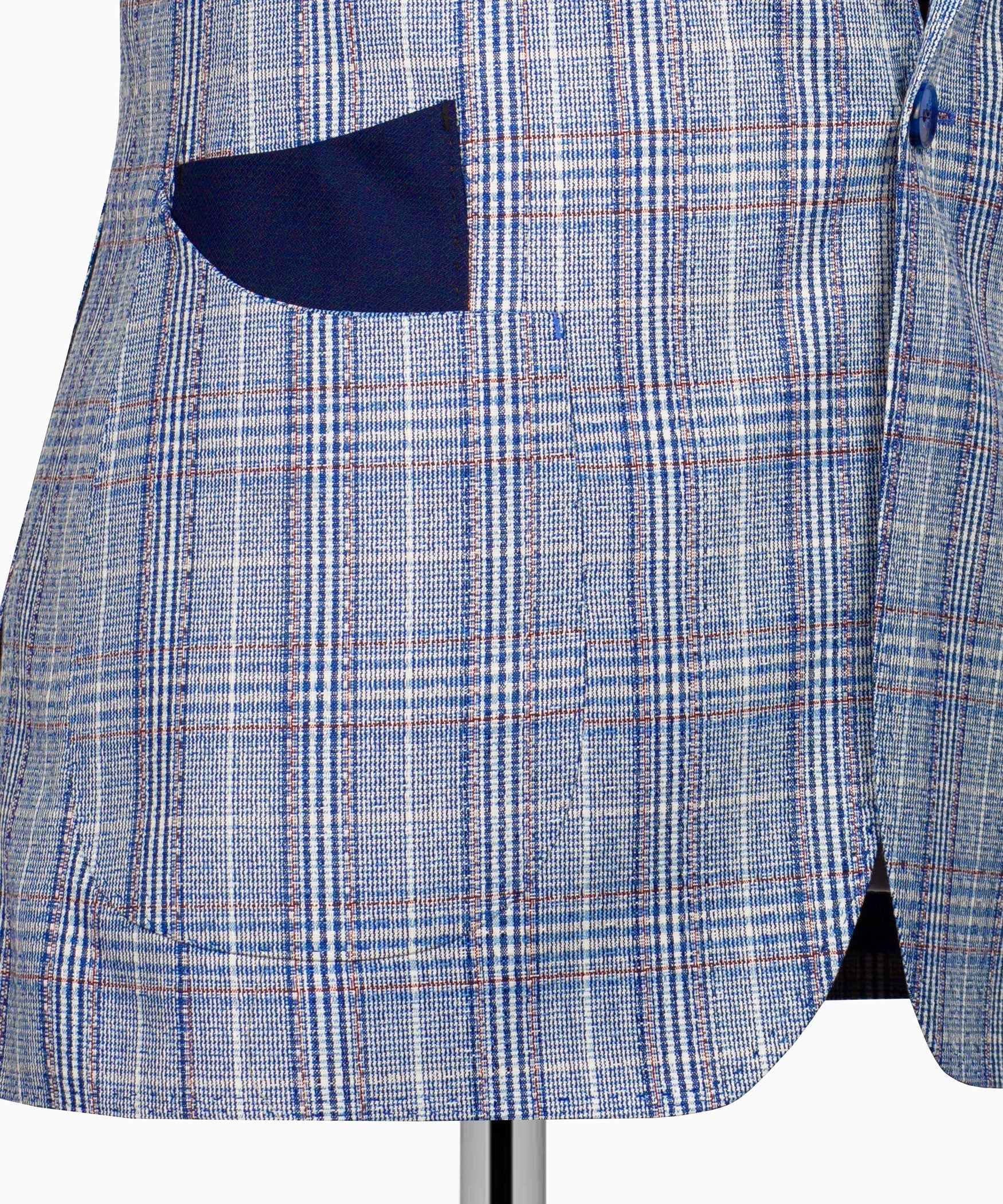 Light blue plaid blazer panel with dark inner pocket opening near hem