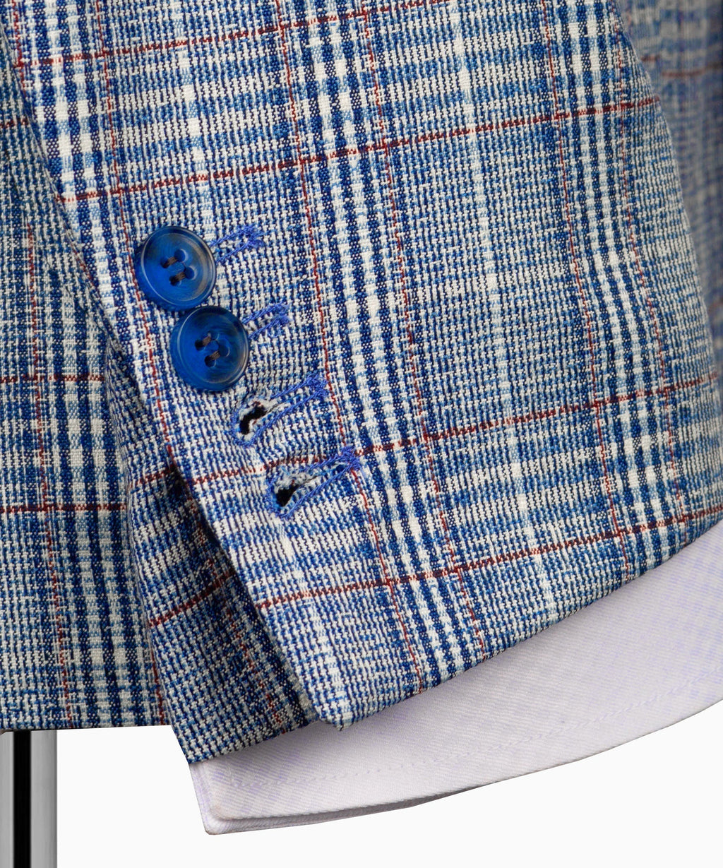 Plaid blazer cuff with two blue buttons and stitched sleeve edge