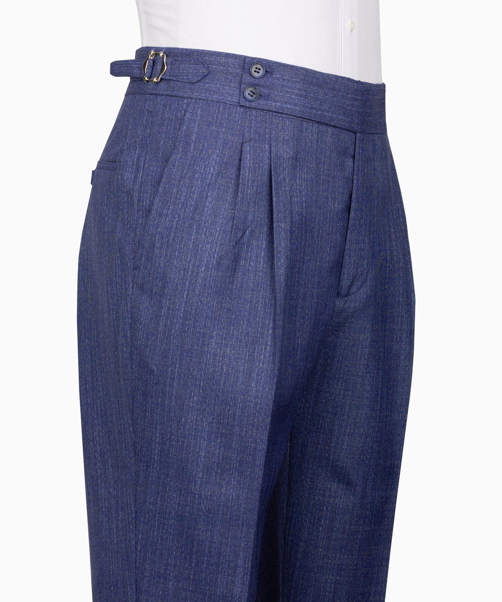 Blue plaid dress trousers with belt loops, pleats, and button closure