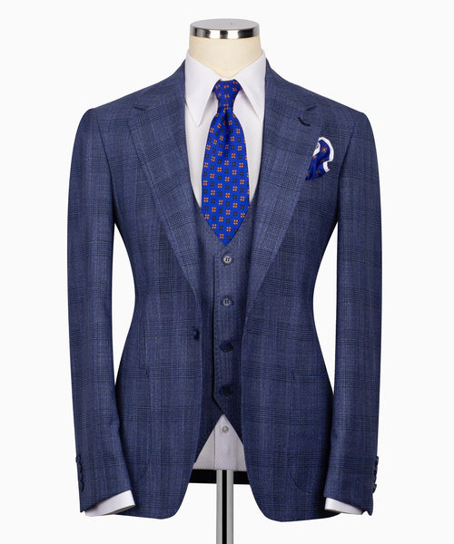 Blue plaid three-piece suit jacket with matching vest and blue patterned tie