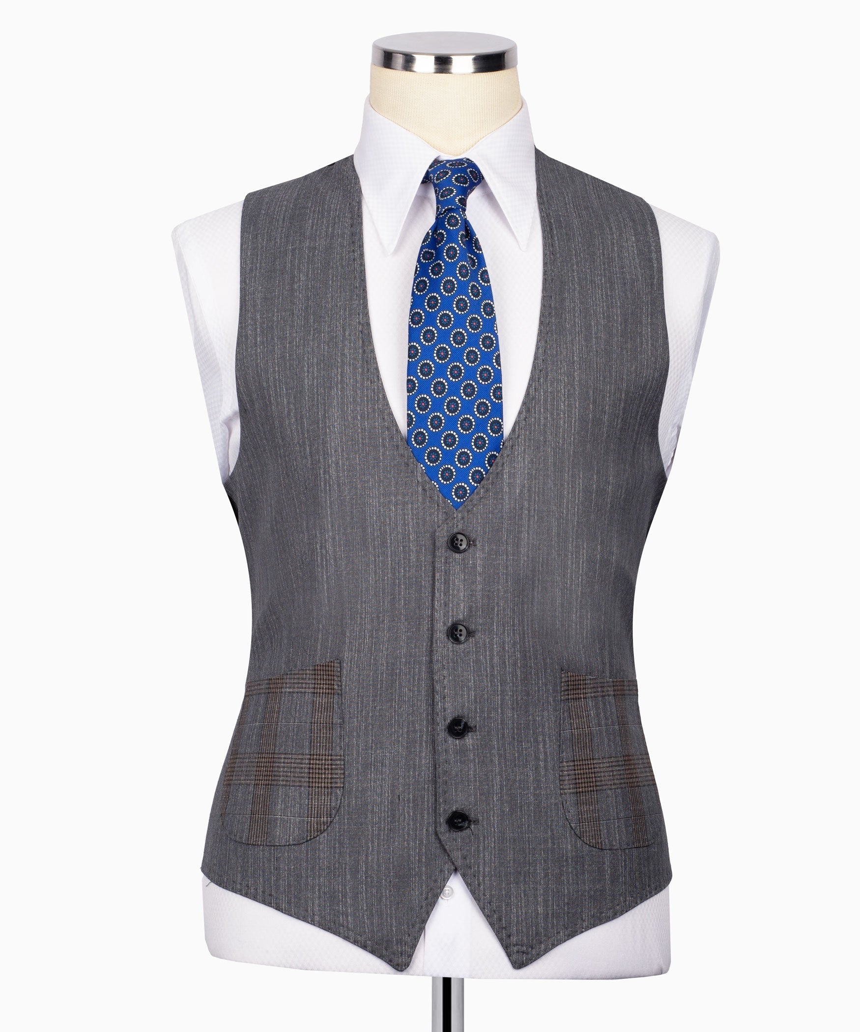 Grey plaid vest front with black buttons and blue patterned tie