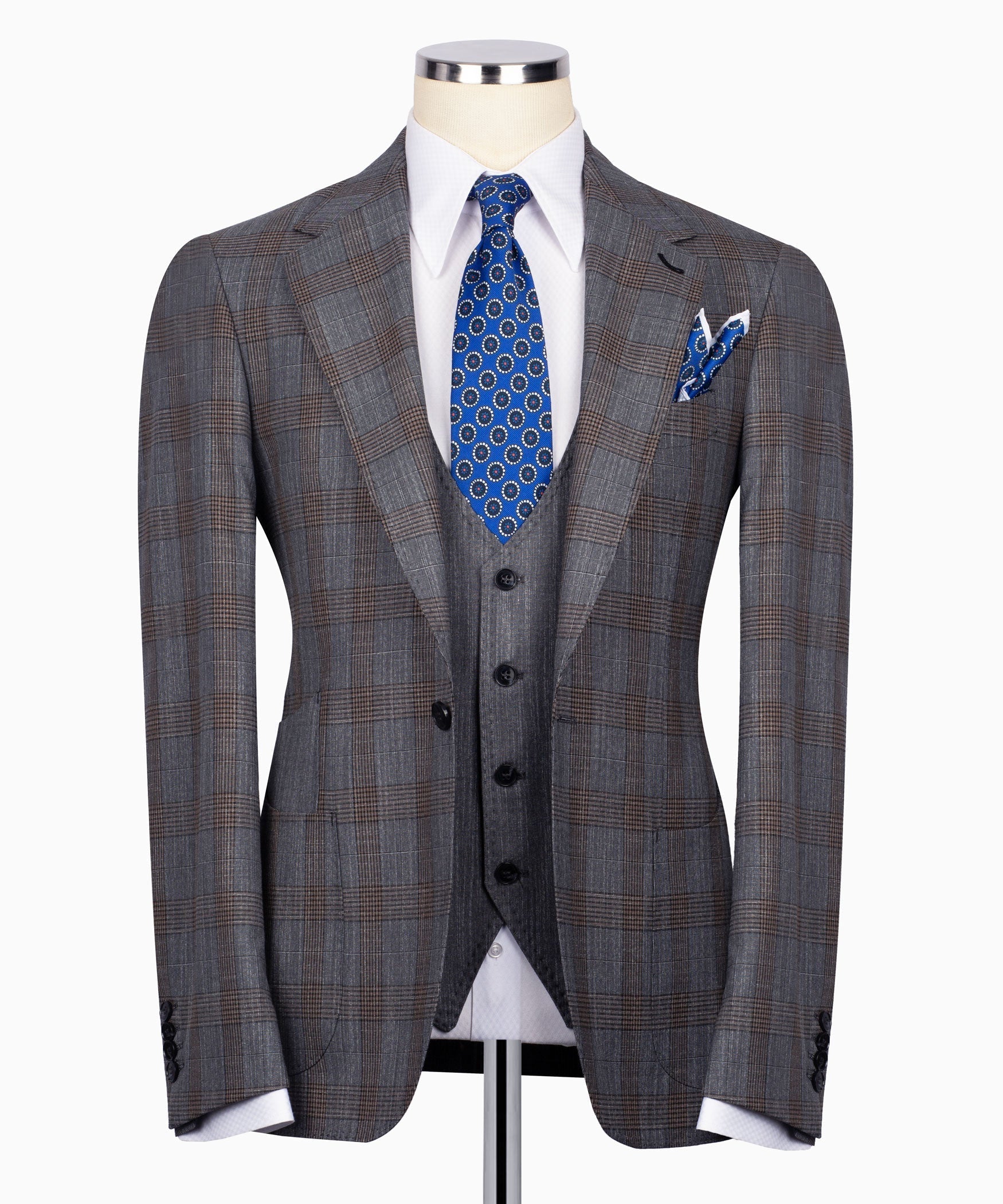 Grey plaid men’s suit jacket with black waistcoat, blue patterned tie and pocket square