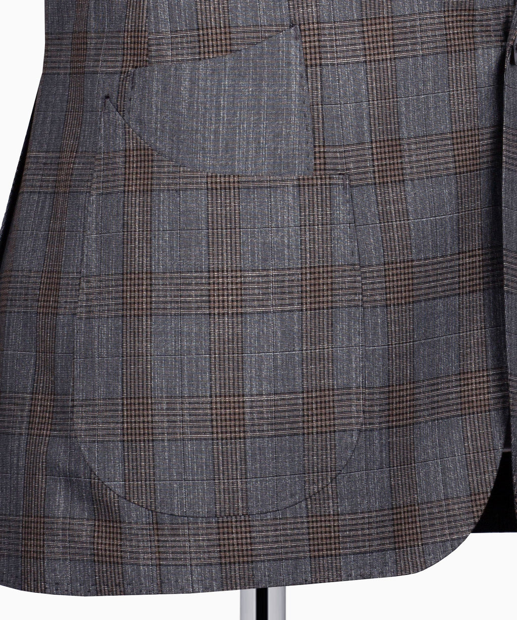 Grey plaid suit fabric close-up with tan grid lines
