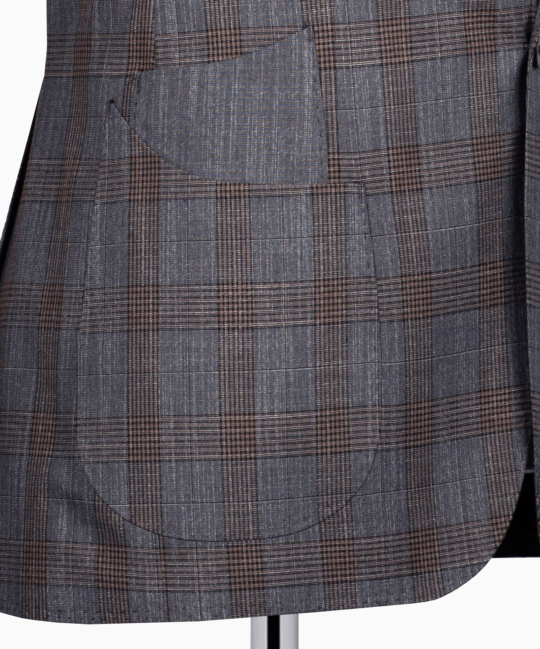 Grey plaid suit fabric close-up with tan grid lines