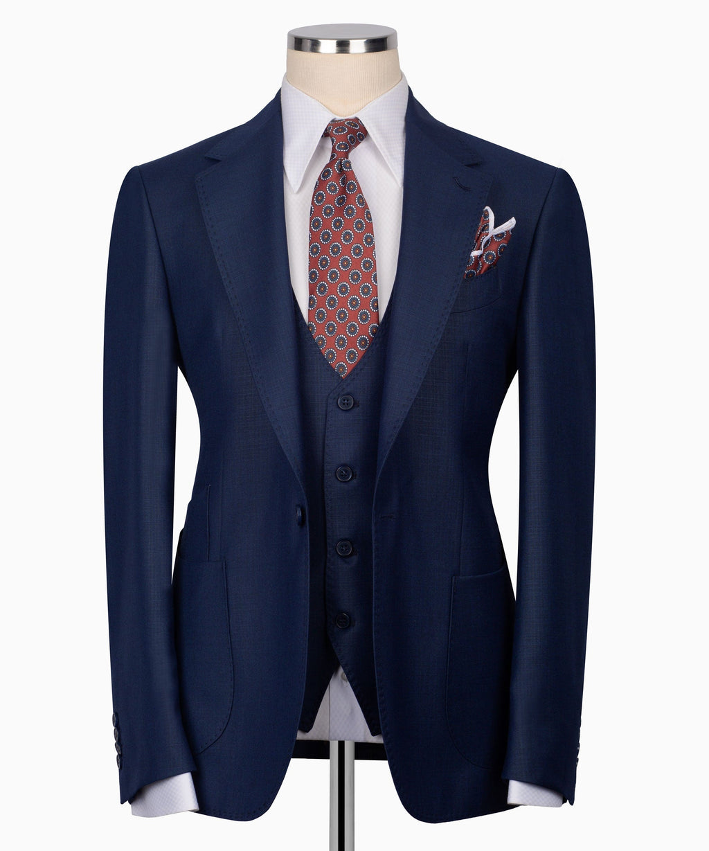 Navy plaid three-piece suit set: tailored jacket, vest, patterned tie, pocket square