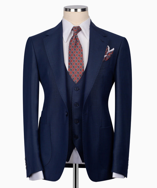 Navy plaid three-piece suit set: tailored jacket, vest, patterned tie, pocket square
