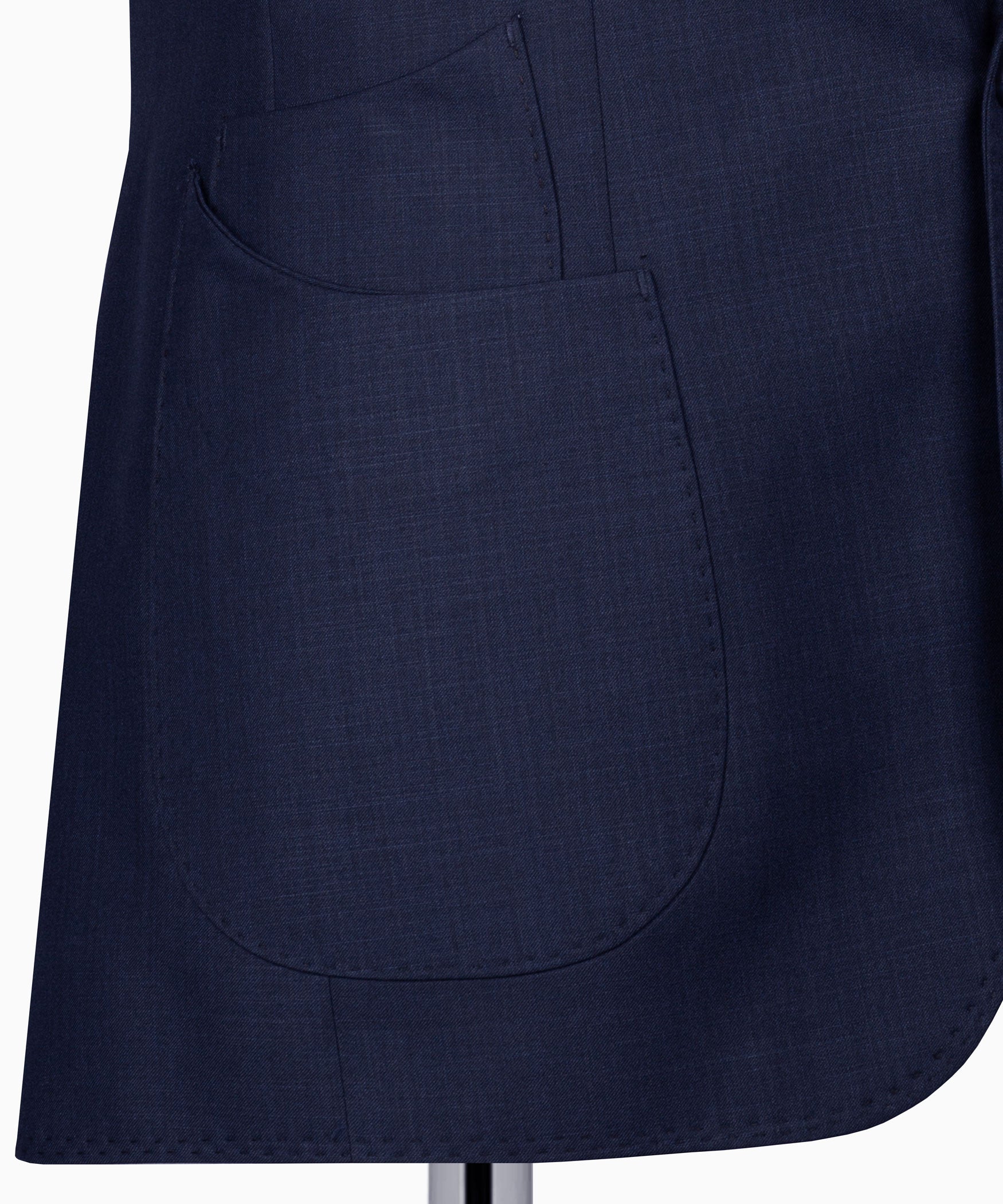Navy plaid suit vest close-up showing front pocket seams and button placket