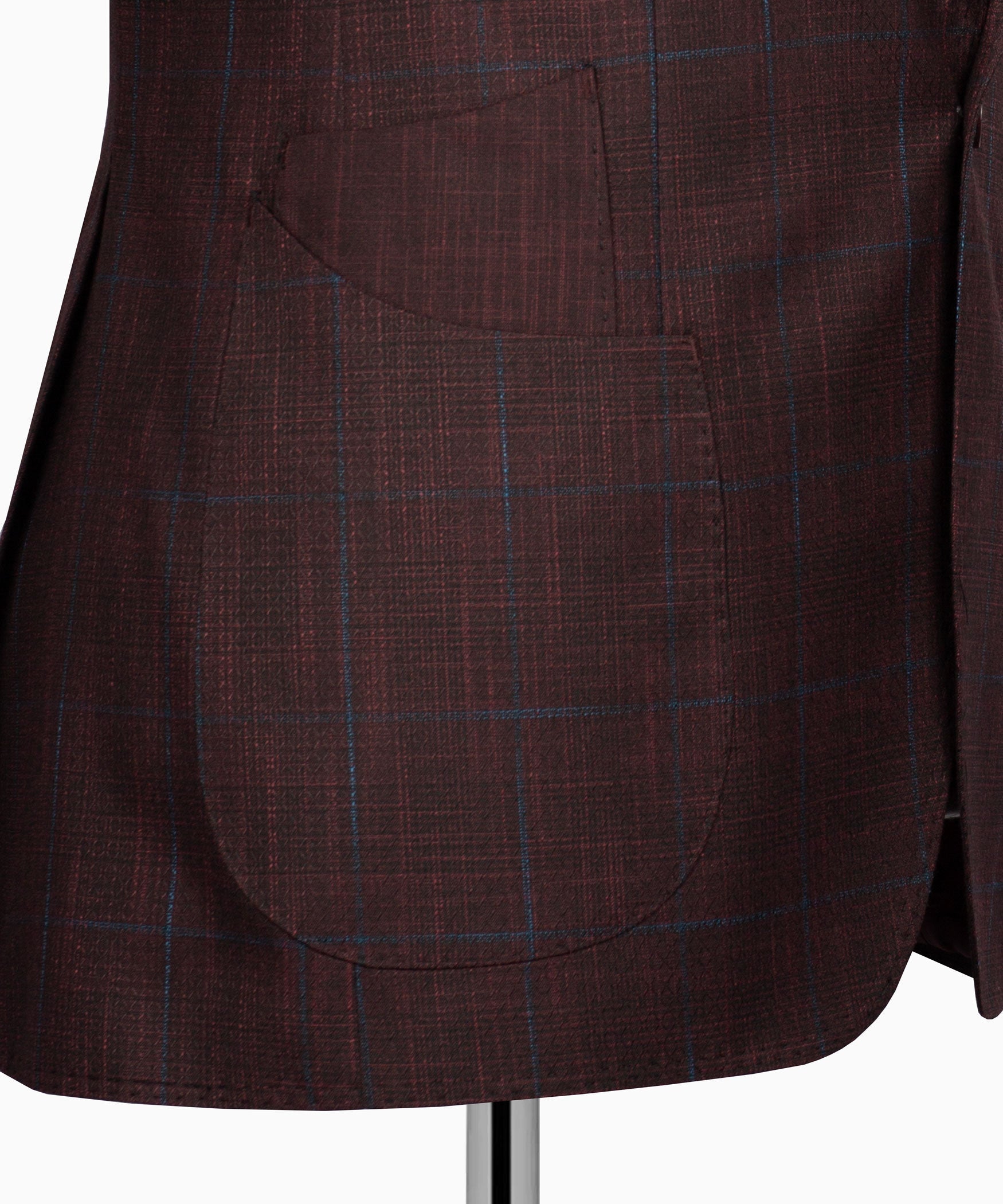 Plaid suit jacket fabric close-up with blue grid pattern on maroon