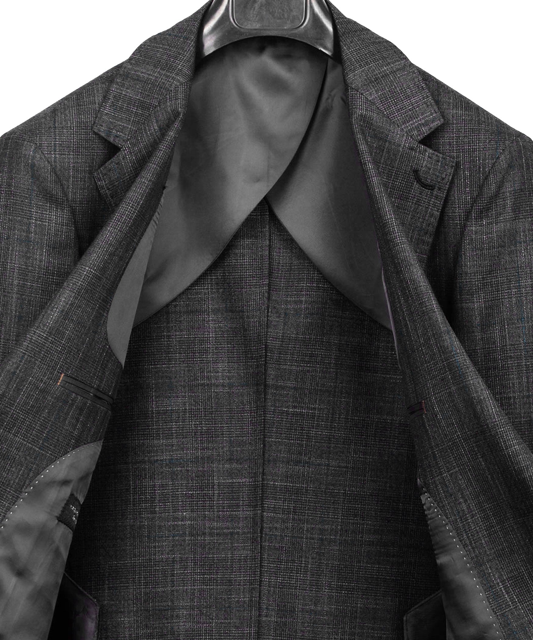 Close-up of dark gray plaid suit jacket lapels with satin lining