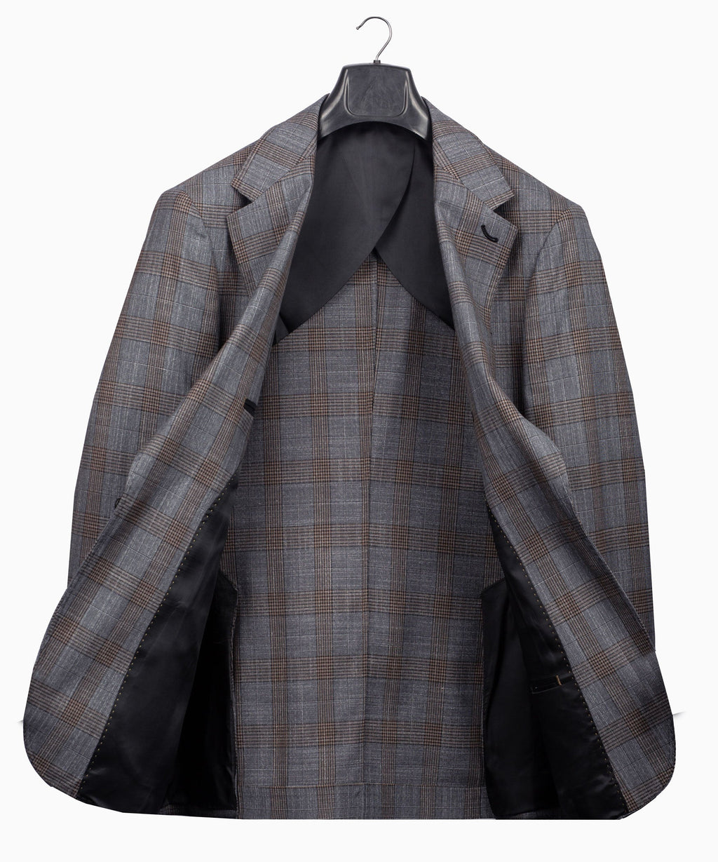 Grey plaid suit jacket hanging open, showing inner lining and front structure