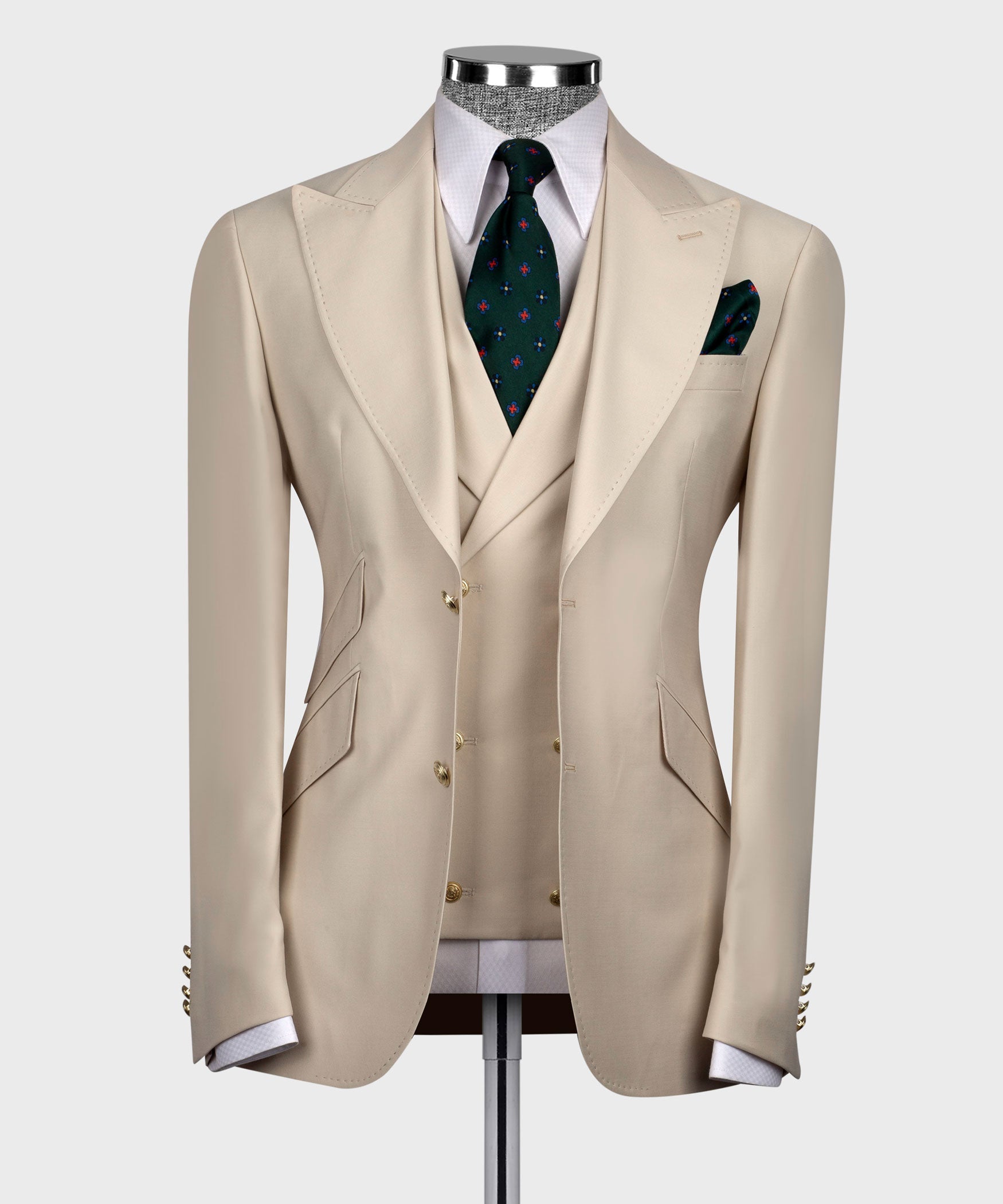 Beige vest suit set: tailored blazer and waistcoat with green patterned tie, pocket square
