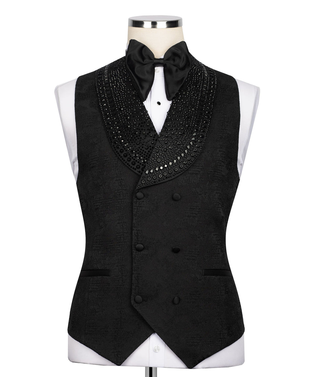 Black stone-embroidered tuxedo vest with satin bow tie and double-breasted button front