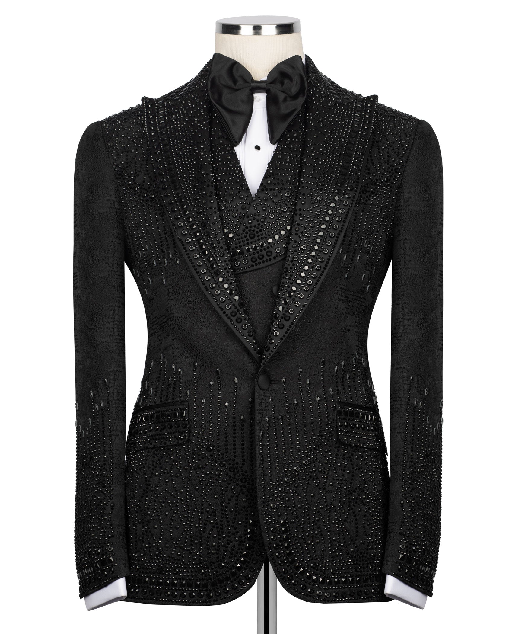 Black embellished tuxedo jacket front view with bow tie and rhinestone-style buttons