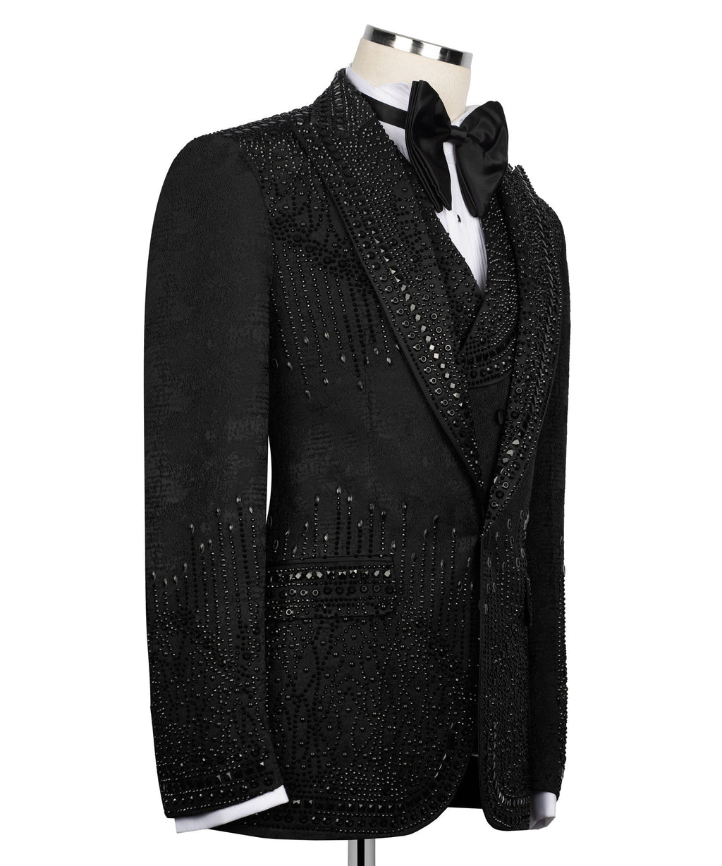 Black tuxedo jacket side view with satin bow tie and jeweled trim detail