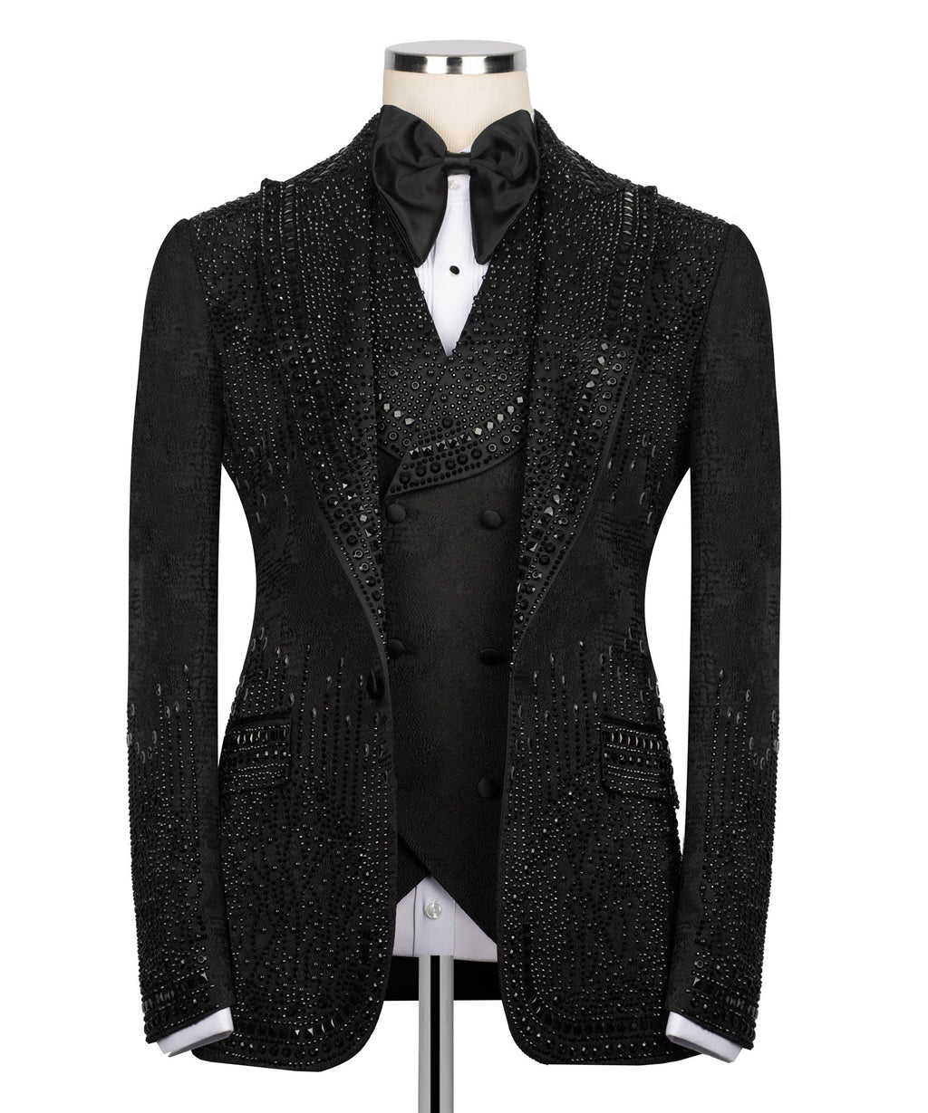 Black tuxedo jacket with bow tie, stone-studded lapels and chest panels