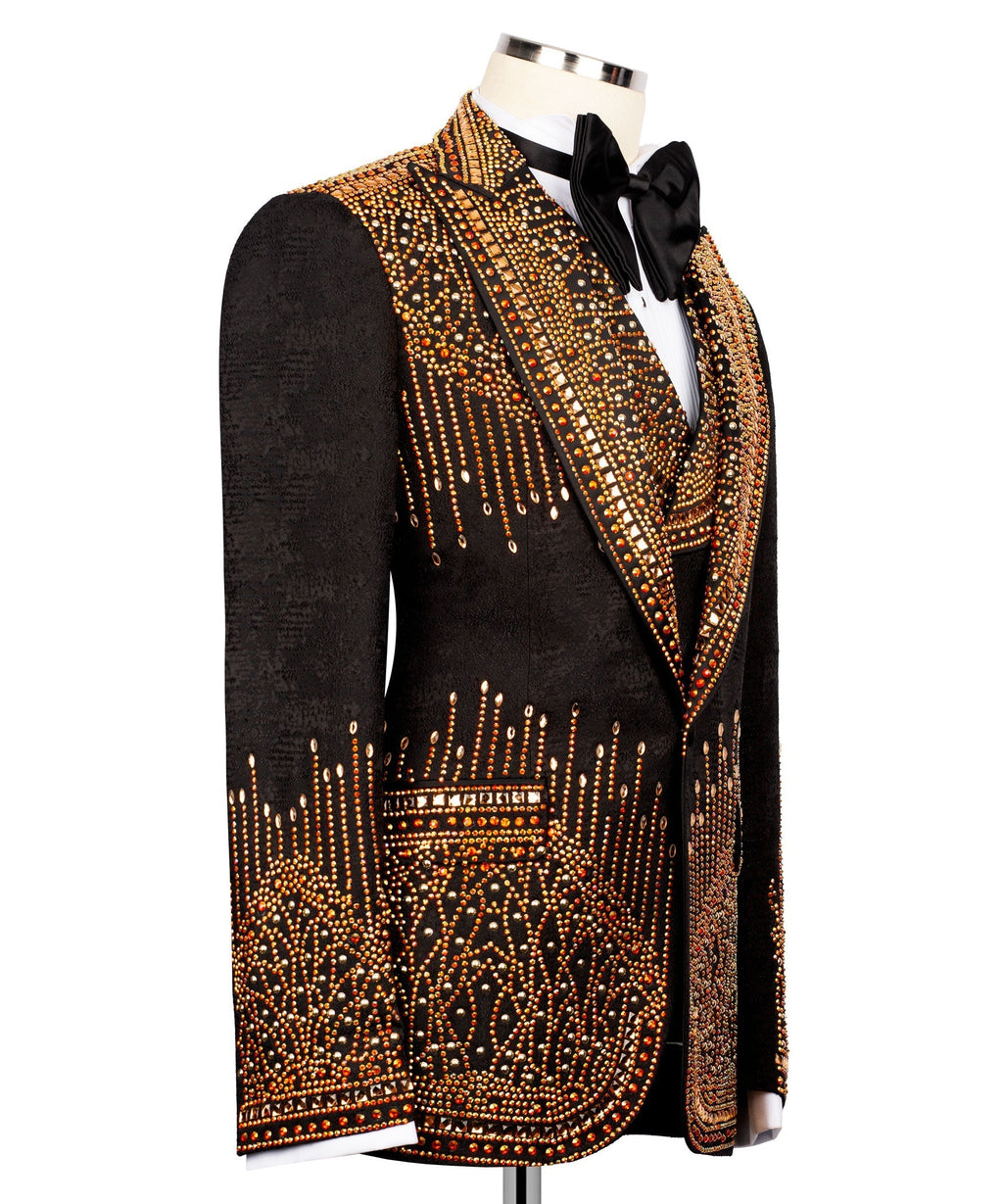Black tuxedo jacket side view with gold-red stone embellishment and satin lapel stripe