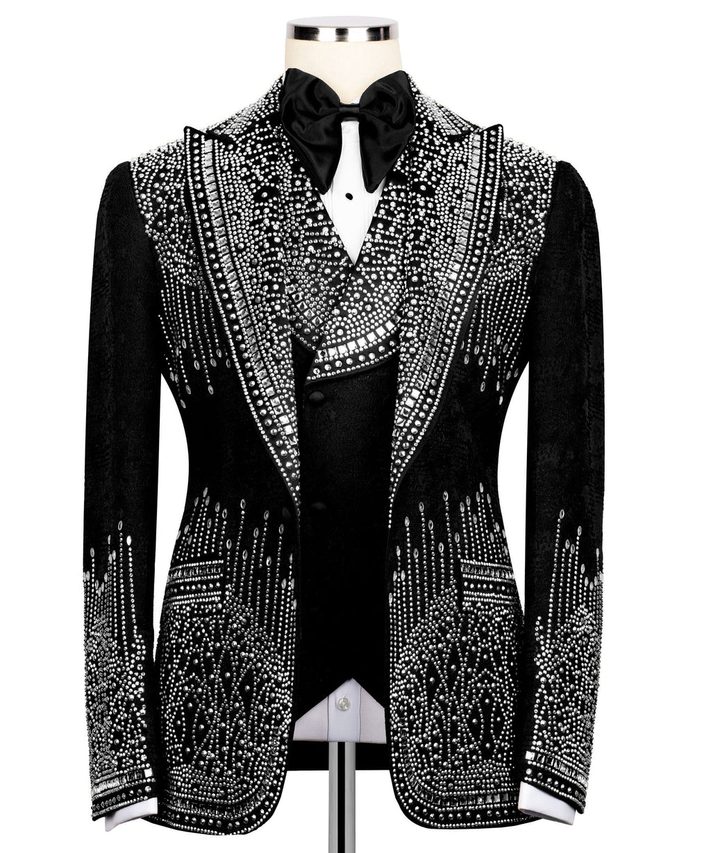 Black tuxedo jacket with stone-embossed trim and satin bow tie, slim fit