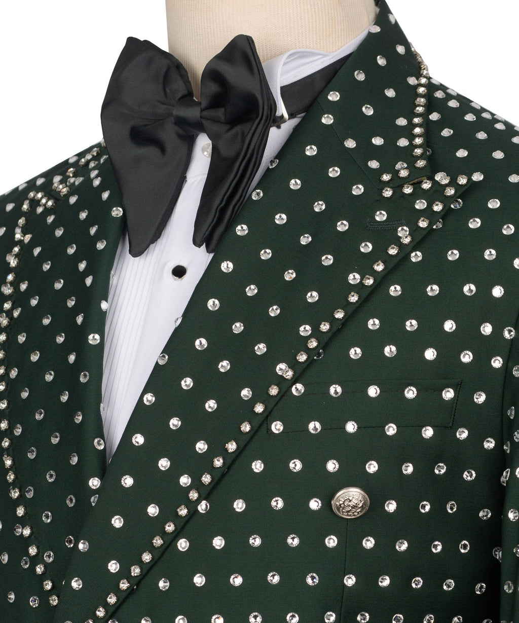 Green tuxedo lapel with silver stone buttons and black bow tie