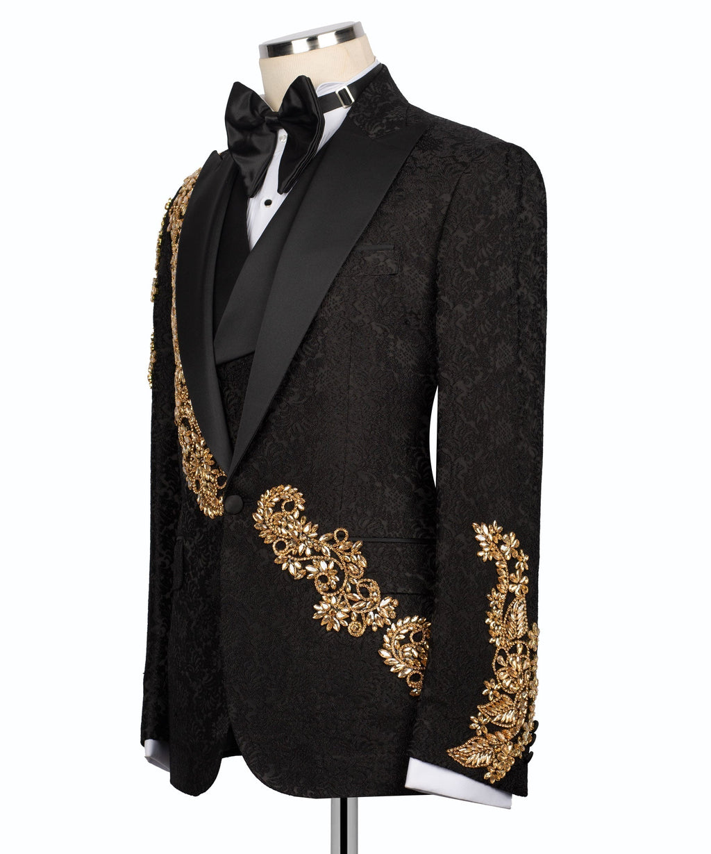 Black tuxedo jacket with gold embroidered sleeve cuff and single-breasted front
