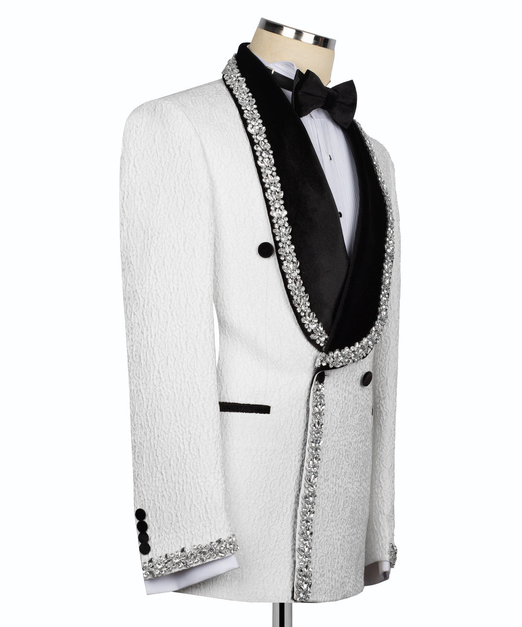 Side view tuxedo jacket in white textured fabric with rhinestone-trimmed black lapel edges