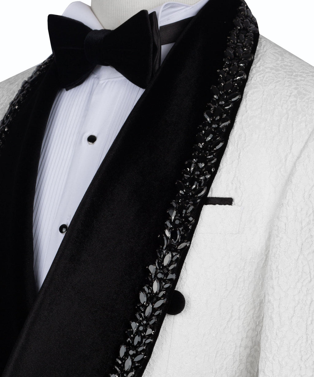 Tuxedo lapel detail with black fabric, sparkling beaded border, and bow tie