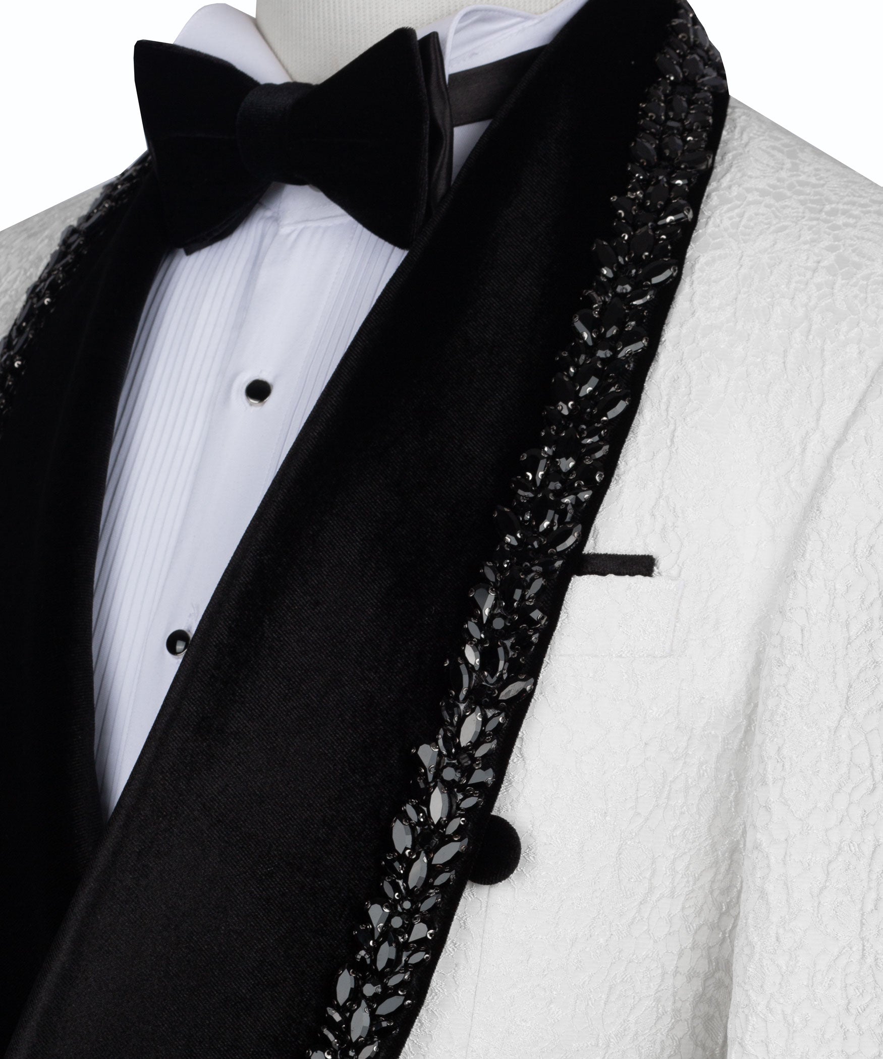 Tuxedo lapel detail with black fabric, sparkling beaded border, and bow tie