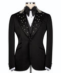 Black men's tuxedo suit with embroidered collar, satin bow tie, and vest