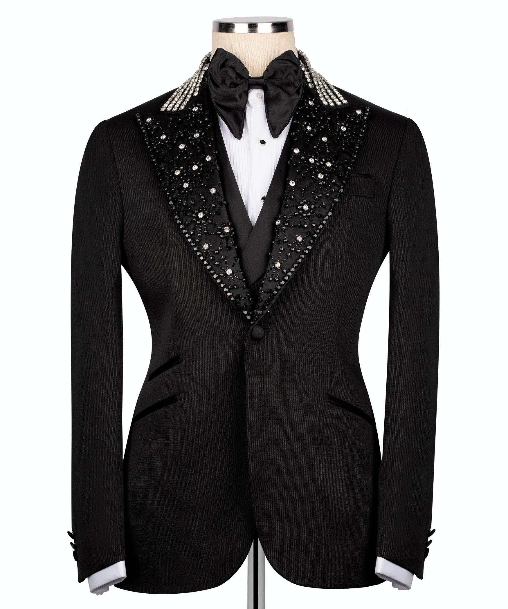 Black men's tuxedo suit with embroidered collar, satin bow tie, and vest