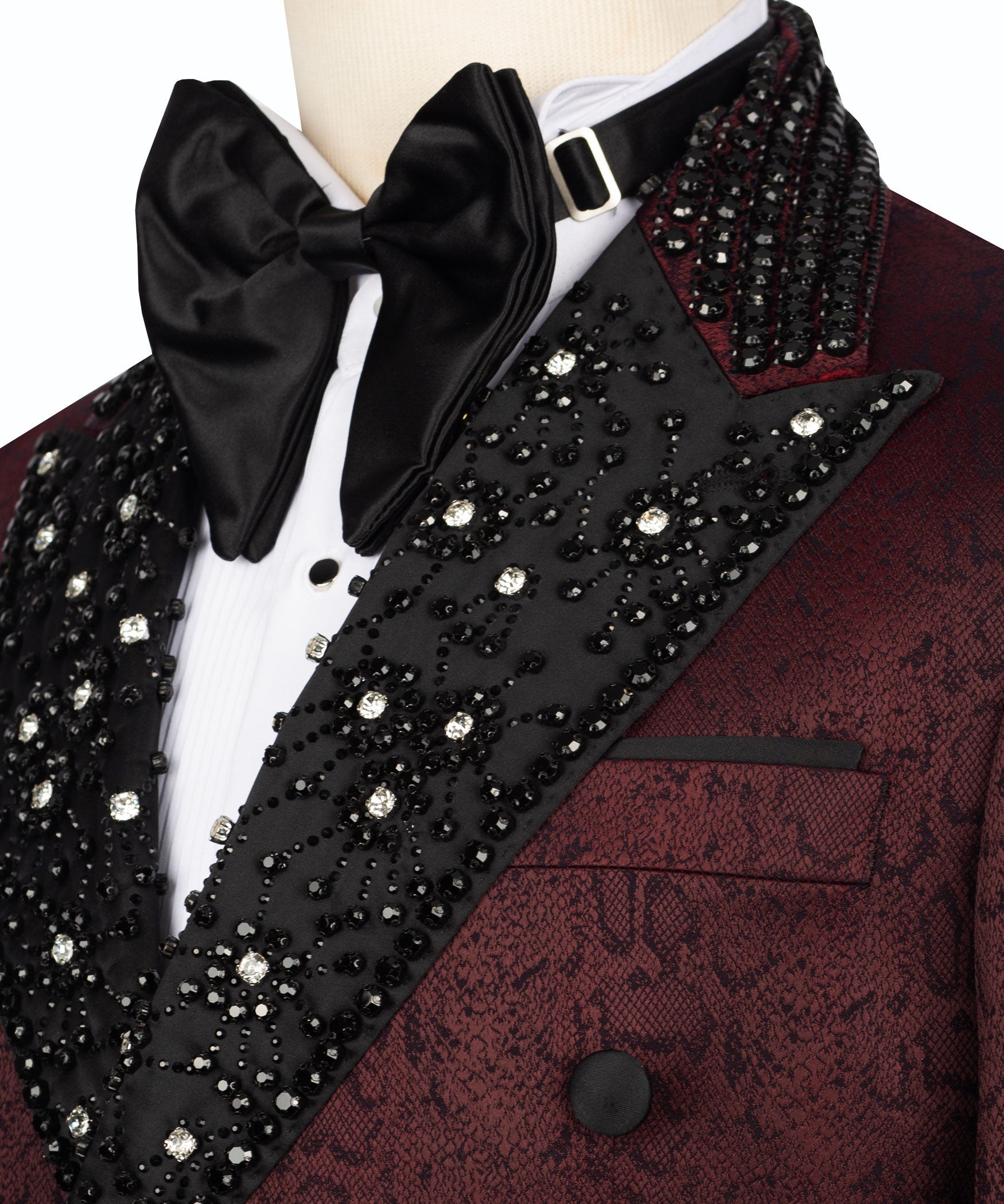 Black bow tie with white shirt; black beaded embroidered lapel on burgundy jacket
