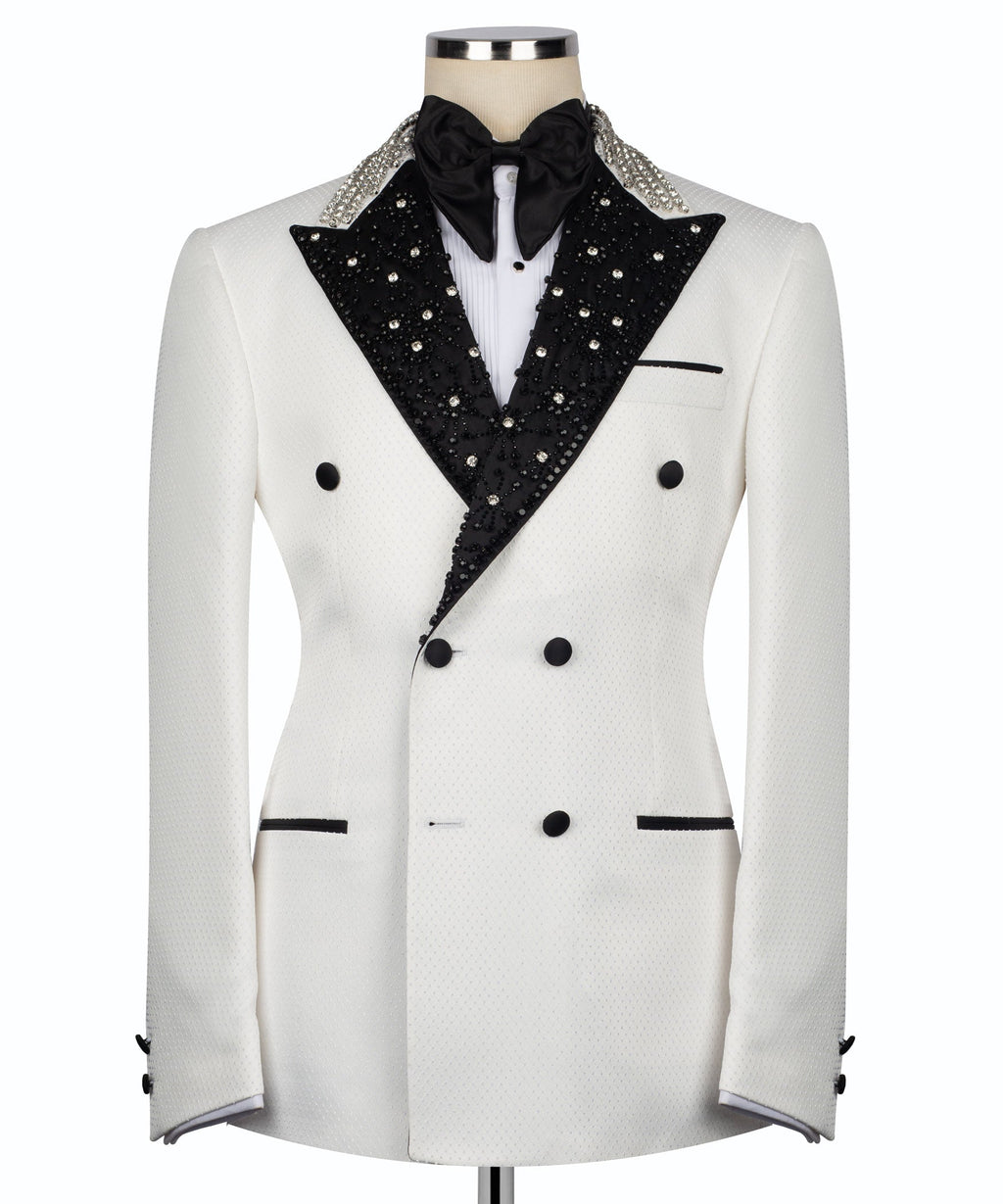 White tuxedo jacket with black embroidered shawl collar and satin bow tie, double-breasted buttons