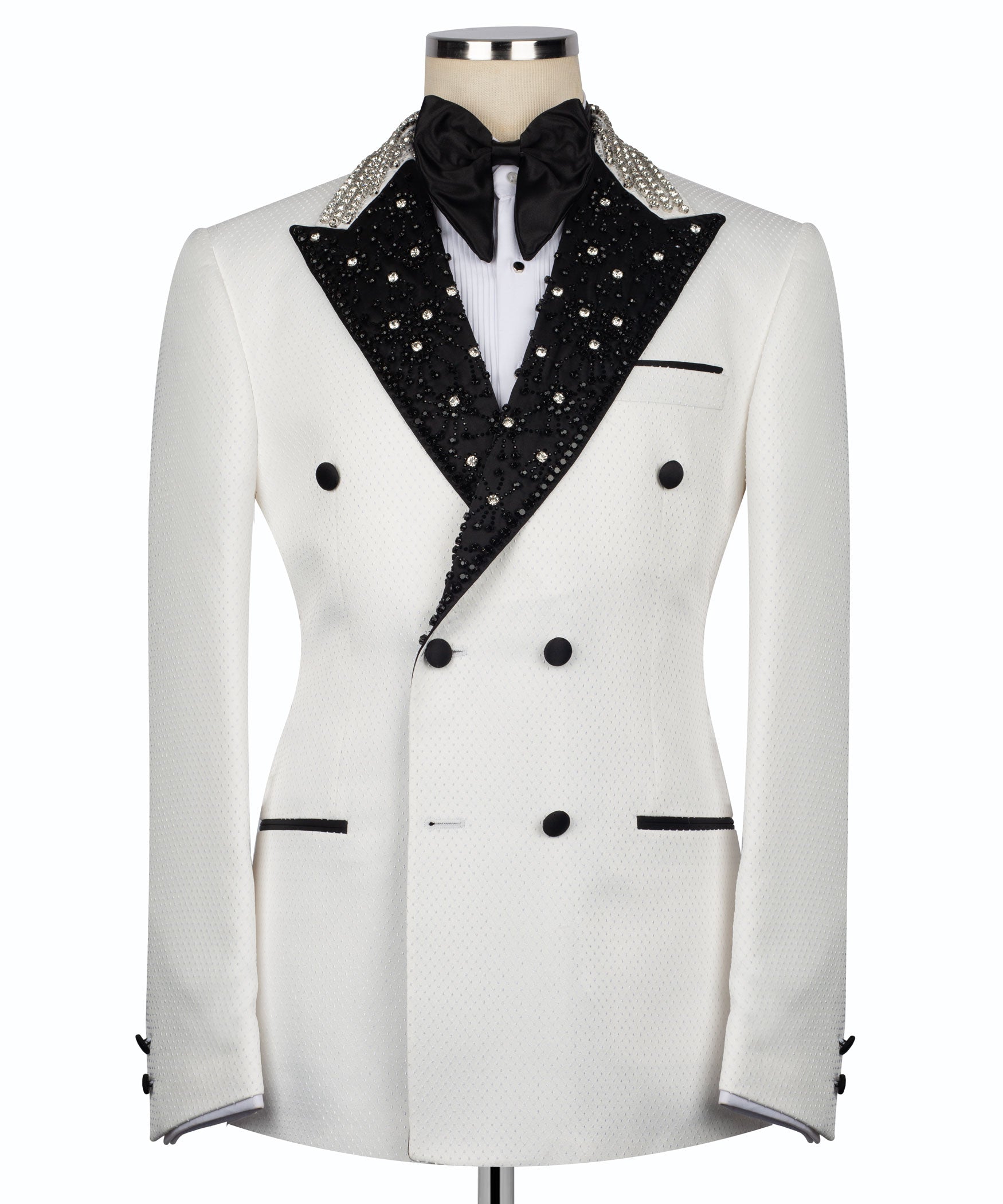 White tuxedo jacket with black embroidered shawl collar and satin bow tie, double-breasted buttons
